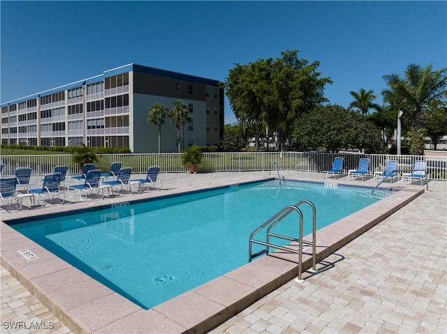 14831 Park Lake Dr Unit 309, Fort Myers, FL 33919 - community pool with a patio area and fence