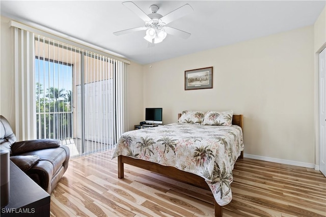 14831 Park Lake Dr Unit 309, Fort Myers, FL 33919 - bedroom with baseboards, access to outside, wood finished floors, and a ceiling fan