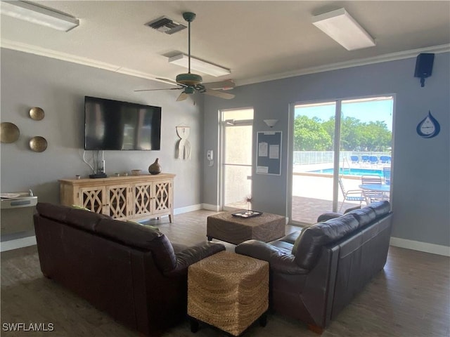 14831 Park Lake Dr Unit 309, Fort Myers, FL 33919 - living area featuring baseboards, ornamental molding, a ceiling fan, and wood finished floors