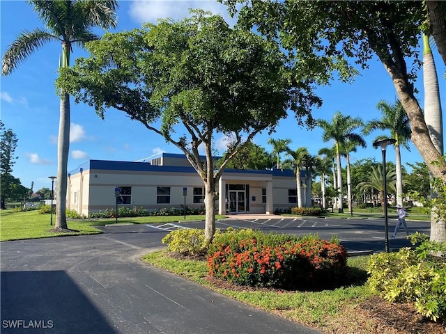 14831 Park Lake Dr Unit 309, Fort Myers, FL 33919 - view of property with uncovered parking