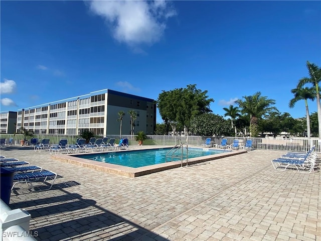 14831 Park Lake Dr Unit 309, Fort Myers, FL 33919 - pool featuring a patio area and fence