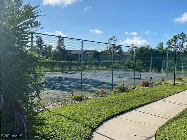 14831 Park Lake Dr Unit 309, Fort Myers, FL 33919 - view of tennis court featuring fence