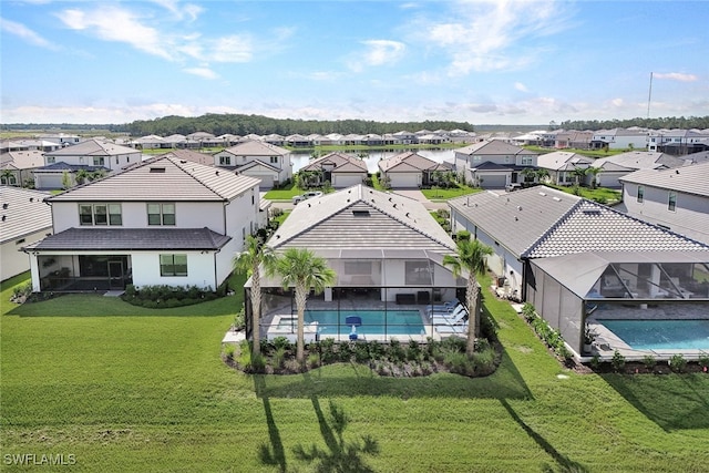 drone / aerial view with a residential view