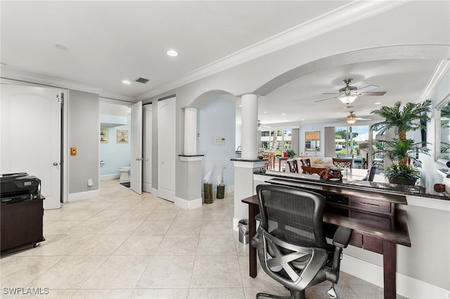 office featuring ceiling fan, light tile patterned floors, and crown molding