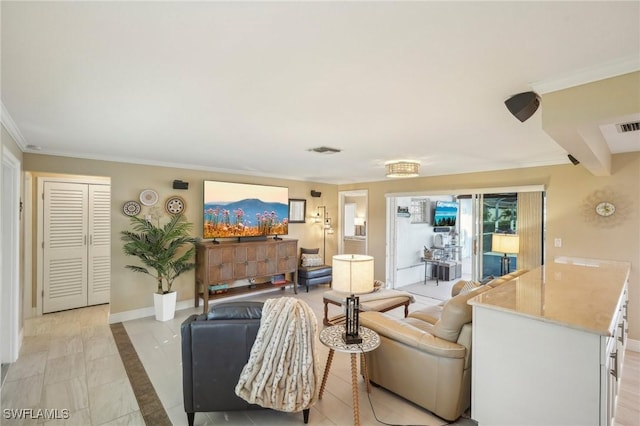 living room with ornamental molding