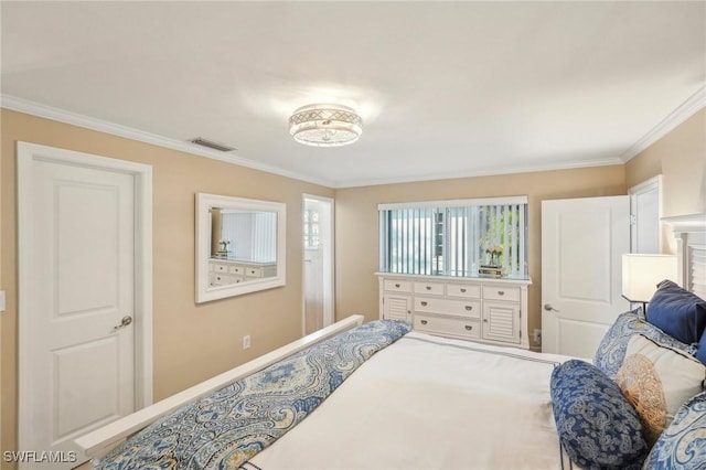 bedroom with ornamental molding