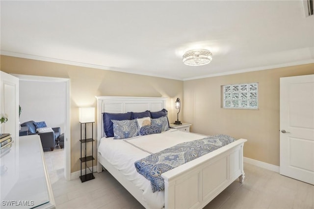 bedroom featuring crown molding