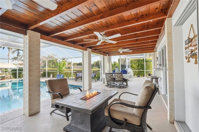 sunroom / solarium featuring a swimming pool, wooden ceiling, and beam ceiling