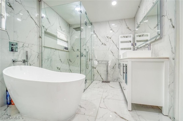 bathroom featuring vanity, tile walls, and plus walk in shower