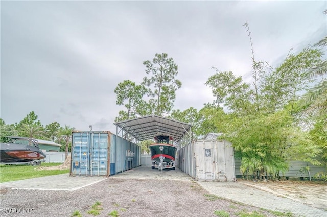 exterior space featuring a carport