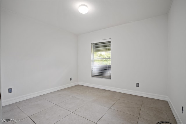 view of tiled empty room