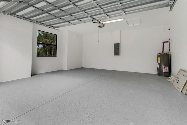 garage featuring a garage door opener, electric panel, and electric water heater