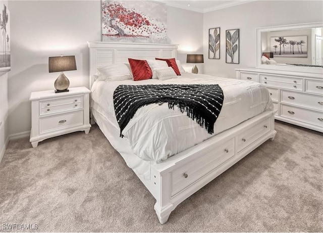 bedroom featuring crown molding and light colored carpet