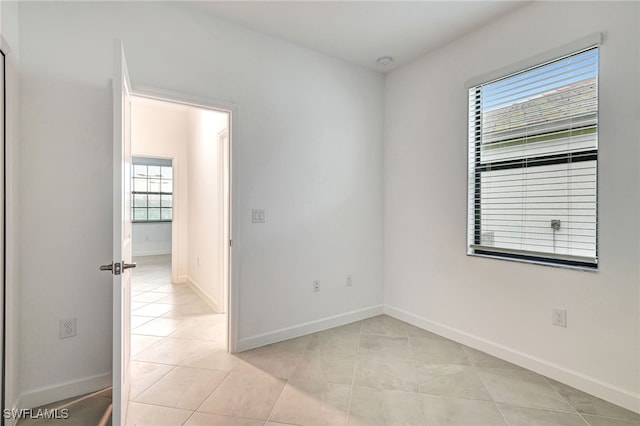 view of tiled spare room