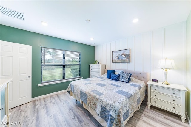 bedroom featuring light wood-type flooring