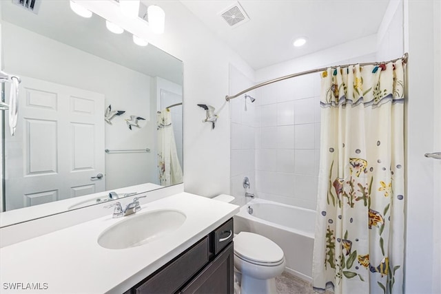 full bathroom featuring vanity, toilet, and shower / bath combo