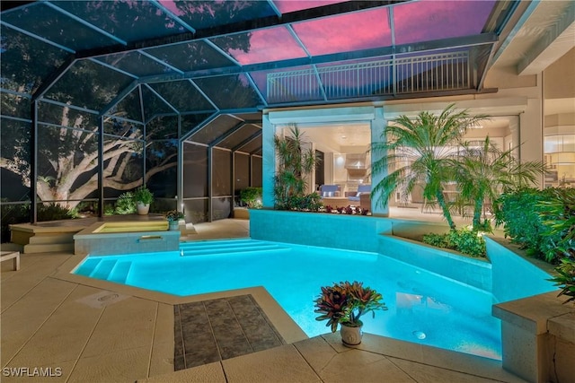 pool featuring a lanai and a patio