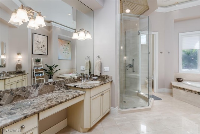 bathroom with two vanities, a sink, a bath, and a shower stall