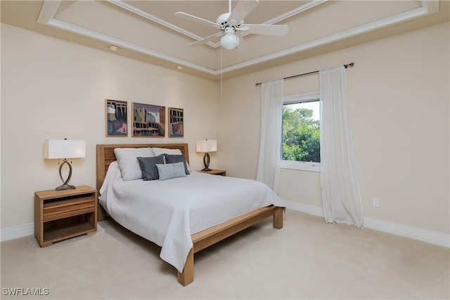 carpeted bedroom featuring a ceiling fan and baseboards