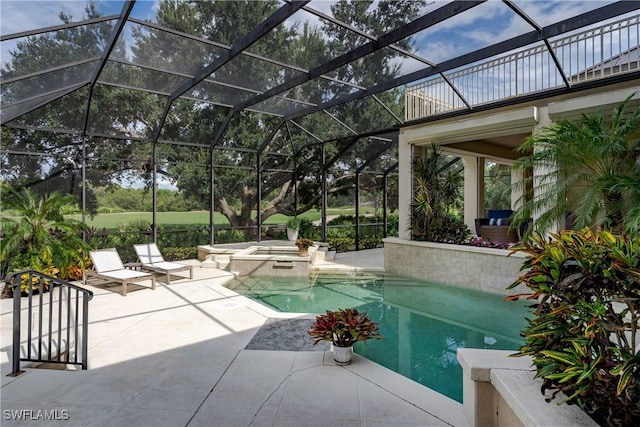 outdoor pool featuring a patio, a lanai, and a jacuzzi