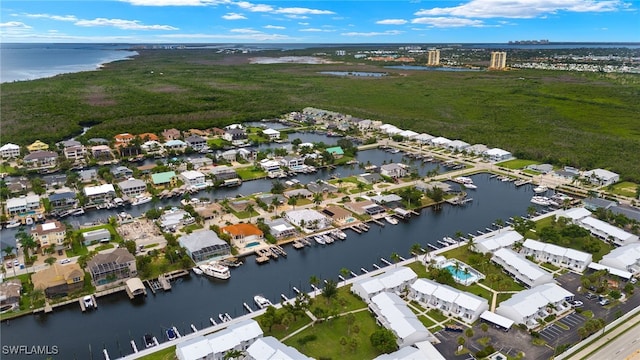 aerial view with a water view and a residential view