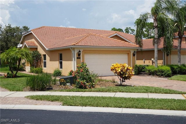 view of front of property featuring a garage