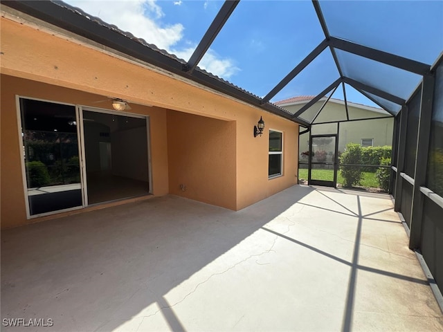 unfurnished sunroom with lofted ceiling