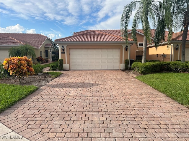 view of front of property featuring a garage