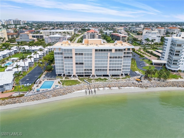 aerial view with a view of the beach and a water view