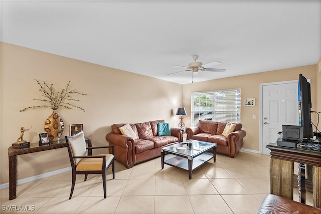 4965 Sandra Bay Dr Unit 103, Naples, FL 34109 - living room with ceiling fan, baseboards, and light tile patterned floors
