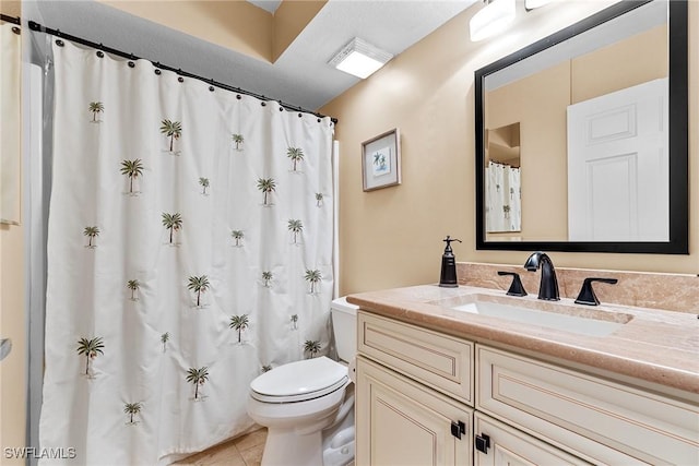 4965 Sandra Bay Dr Unit 103, Naples, FL 34109 - bathroom with toilet, vanity, and tile patterned floors