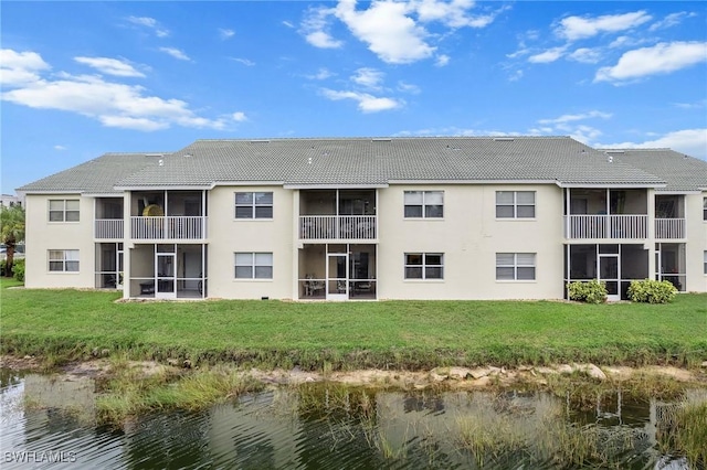 4965 Sandra Bay Dr Unit 103, Naples, FL 34109 - view of building exterior with a water view