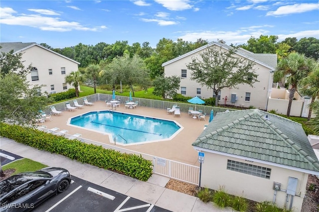 4965 Sandra Bay Dr Unit 103, Naples, FL 34109 - community pool with fence and a patio
