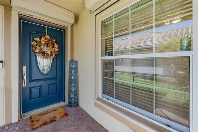 entrance to property with covered porch