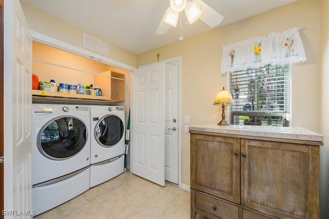 laundry room with washer and dryer and ceiling fan