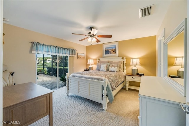 carpeted bedroom with access to exterior and ceiling fan