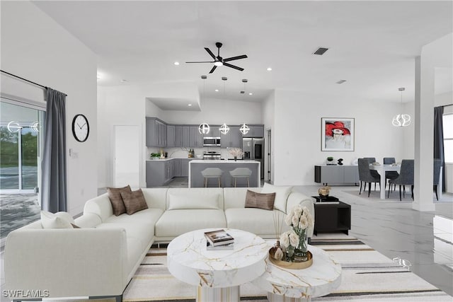 living room featuring ceiling fan