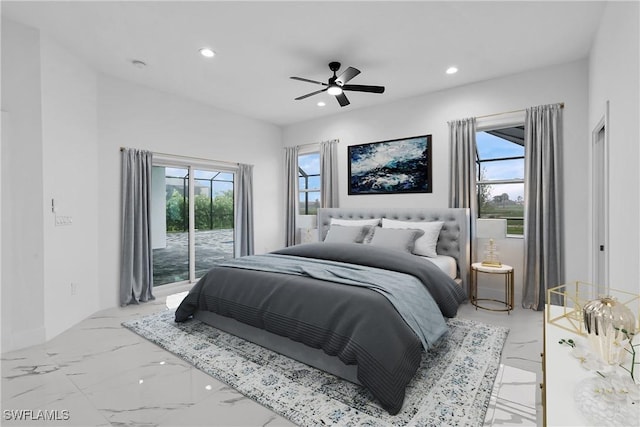 bedroom featuring ceiling fan, access to exterior, and multiple windows