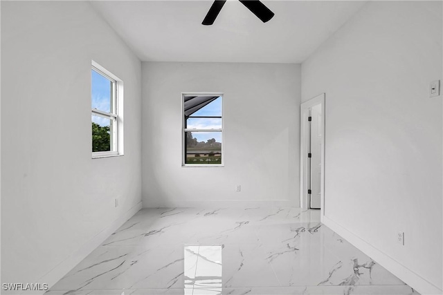 unfurnished room with ceiling fan