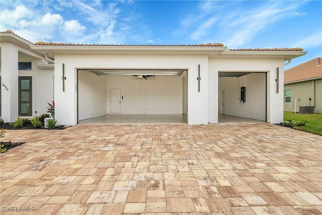 garage featuring central AC unit