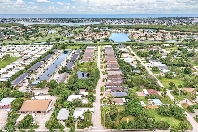 bird's eye view with a water view