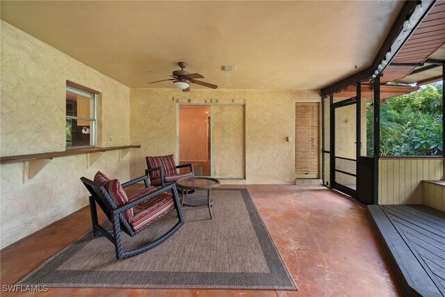 view of patio / terrace with ceiling fan and visible vents