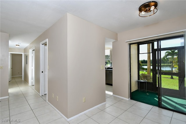 entryway featuring light tile patterned floors