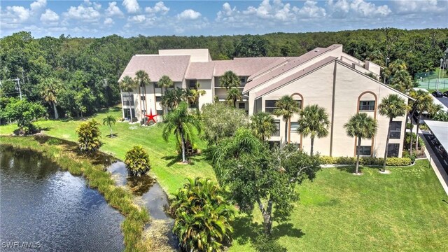 bird's eye view with a water view