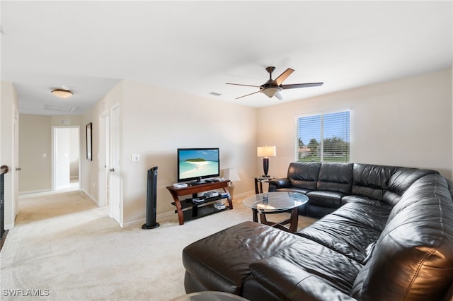 living room featuring ceiling fan and light carpet