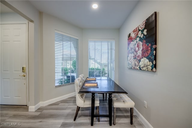 dining area with hardwood / wood-style flooring