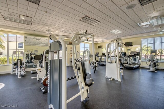 exercise room featuring a paneled ceiling