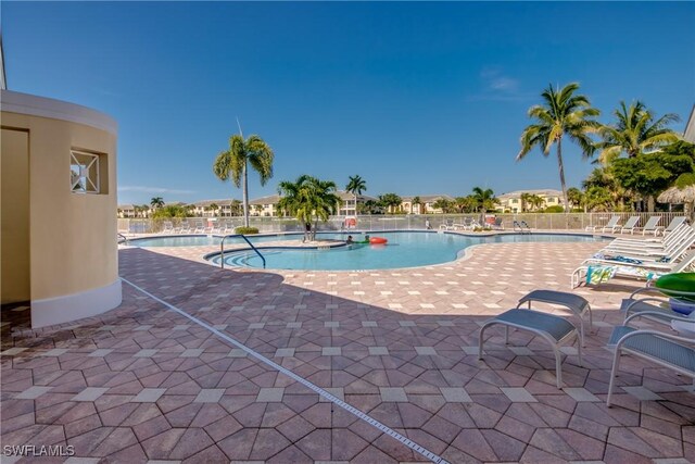 view of swimming pool featuring a patio area