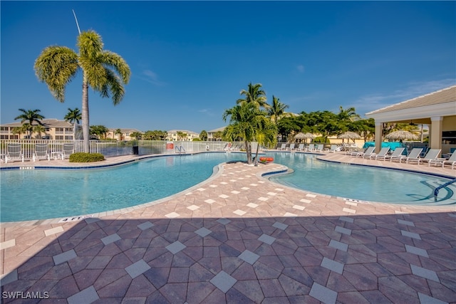 view of swimming pool featuring a patio