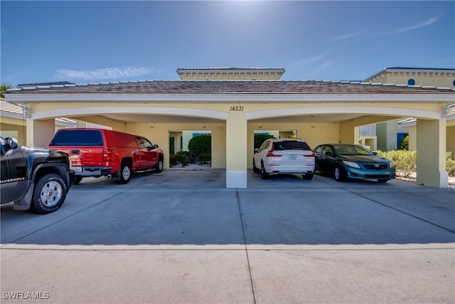 view of parking with a carport